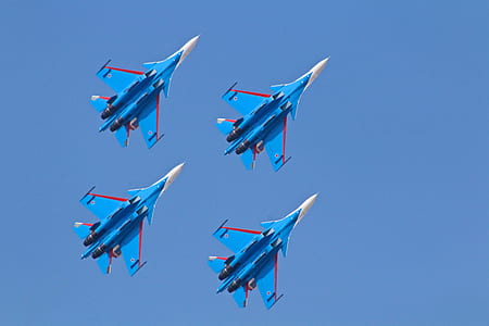 four blue-and-white aircrafts thumbnail