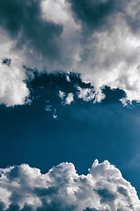 white clouds on blue sky thumbnail
