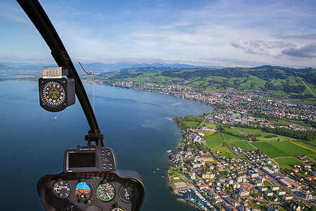 aerial photo of city beside shore thumbnail