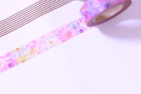 pink and yellow floral print self-adhesive tape on white surface thumbnail