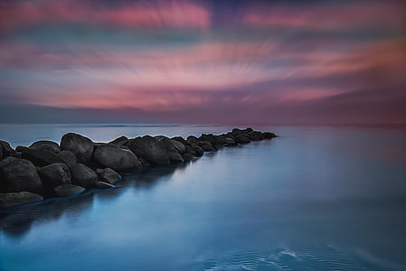 photo of rocks on sea thumbnail