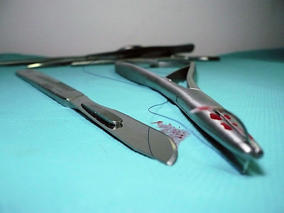 close up photography of medical knife and forceps thumbnail