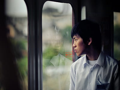 man looking outside thumbnail