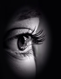 close-up photography of person's open left eye thumbnail
