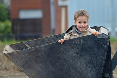 boy in backhoe blade thumbnail