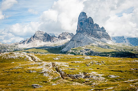 mountain across the land during daytime thumbnail