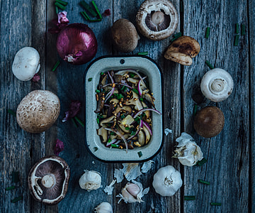 mushrooms on gray wooden surface thumbnail