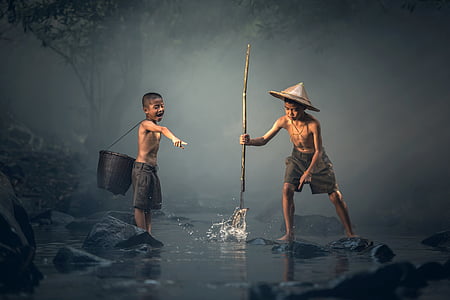 two boy playing on water thumbnail