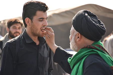 man touching man's mouth thumbnail