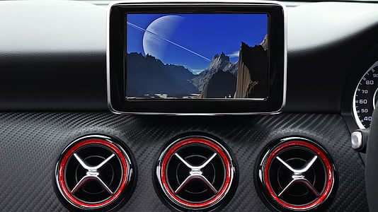 black GPS monitor on dashboard thumbnail
