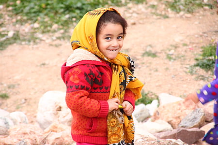 boy smiling wearing red jacket thumbnail