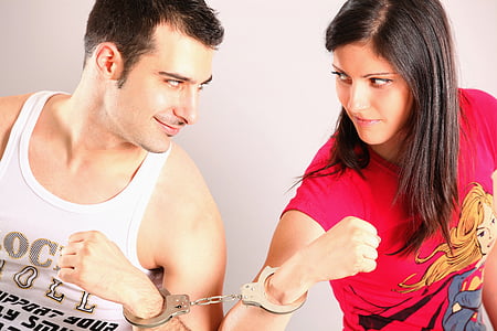 man and woman wearing handcuffs thumbnail