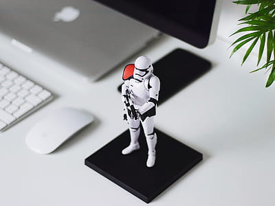 plastic Storm Trooper figure beside Magic Mouse thumbnail