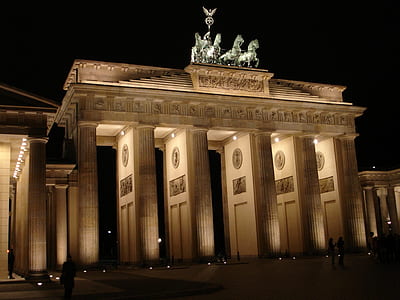 beige concrete gate during night thumbnail