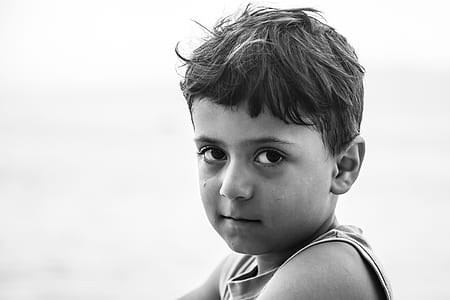 grayscale photography of boy thumbnail