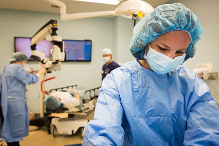 woman in blue surgical suite thumbnail