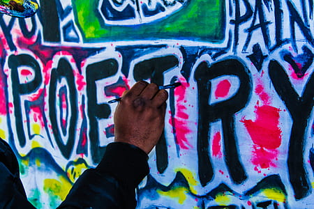 person painting graffiti thumbnail
