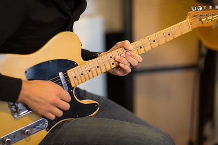 man playing telecaster electric guitar thumbnail