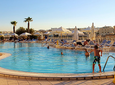 boy jumps on swimming pool thumbnail