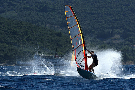 man playing sailboat thumbnail