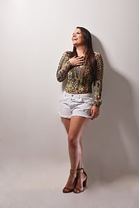 woman standing and leaning on the wall thumbnail