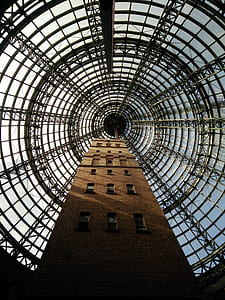 low angle photograph of brown building thumbnail