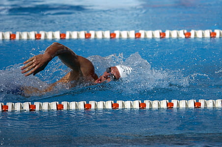 man in white swim cap on pool thumbnail