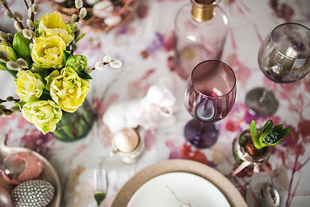 Easter table with cute pink decorations, flowers, catkins and eggs thumbnail
