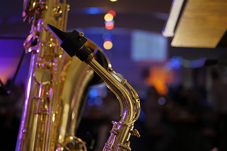 closeup photo of gold saxophone thumbnail