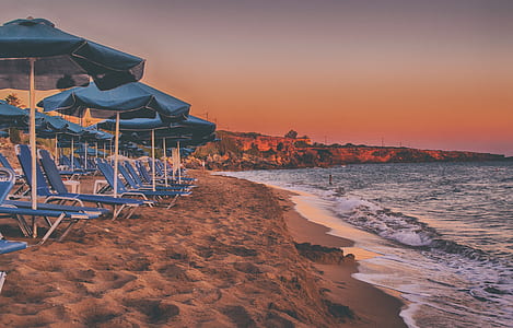 House and Parasols Near Beach thumbnail