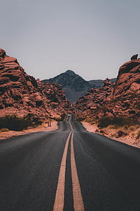 black asphalt road during daytime thumbnail