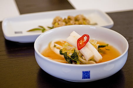 soup with vegetables on white bowl thumbnail