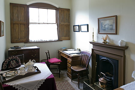 brown wooden furnitures inside the house thumbnail
