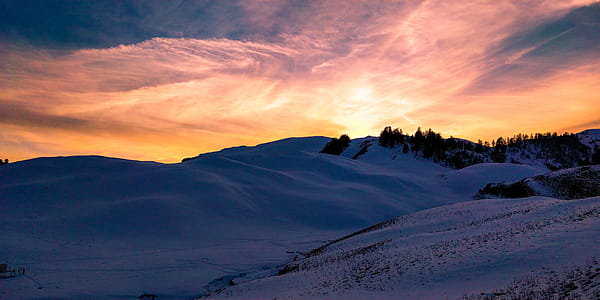 White Snowy Desert during Sunset thumbnail