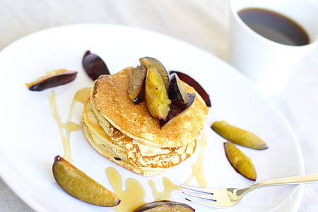 pancake with honey on plate thumbnail