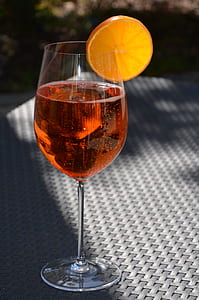 clear wine glass placed gray table thumbnail