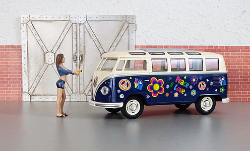 woman standing in front of Volswagen van thumbnail