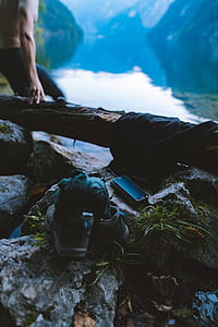shallow focus photography of shoes and smartphone thumbnail