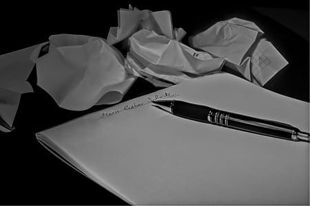 black click pen on white printer paper thumbnail