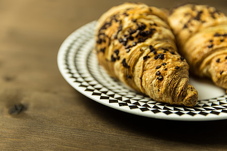 Closeup shot of a pair of chocolate croissants thumbnail