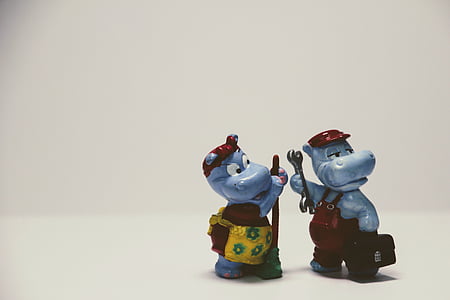 two rhino figurines thumbnail