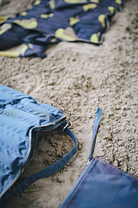 Various things in the beach sand thumbnail