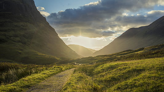 road near mountain during sunset thumbnail