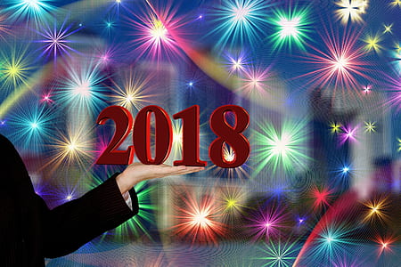 person holding 2018 and fireworks illustration thumbnail