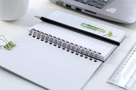 white notebook and black pencil thumbnail