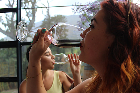 woman drinking wine thumbnail
