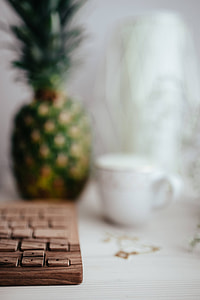 Wooden keyboard and cup of coffee thumbnail