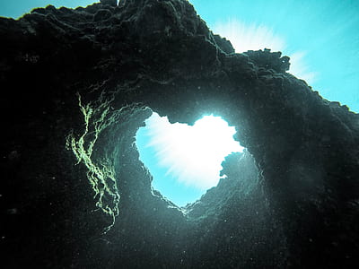low-angle photography of holed rock thumbnail