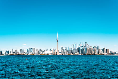 City Buildings Near Sea Under Blue Sky thumbnail