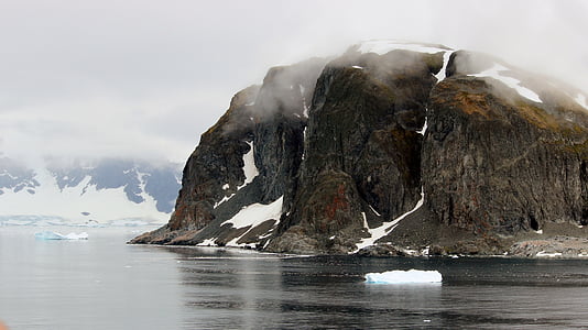 icy rock near shore thumbnail